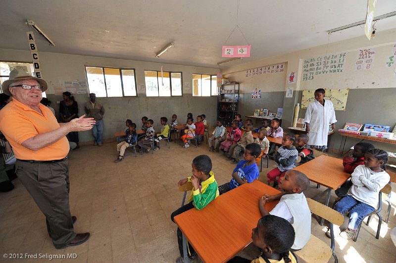 20120328_100333 Nikon D3-Edit 2x3.jpg - Dr. Irving Fish talking with the children